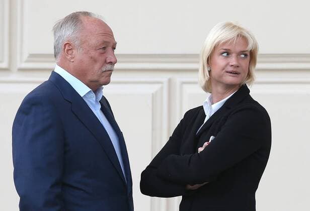 MOSCOW, RUSSIA - SEPTEMBER 13, 2016: CSKA s deputy head, Olympic gymnastics champion Svetlana Khorkina (R) with husband Oleg Kochnov outside Moscow s Bolshoi Theatre where a production of Giuseppe Verdi s opera Simon Boccanegra is to be presented by the Teatro alla Scala (Milan s grand opera house) as part of the 2016 Chereshnevy Les Open Art Festival. Artyom Korotayev TASS  TS031133