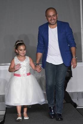 The Costa Rican designer Henry Picado greets with his daughter Chloe after the presentation of his collection, in New York, US, on 14 September 2016. Fashion show of the designer Henry Picado !ACHTUNG: NUR REDAKTIONELLE NUTZUNG!  NUE01 20160915-636095167407817648