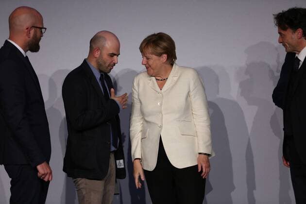 Presentation of the M100 Media Prize in Potsdam The presentation of the M100 Media Prize in the Orangery Palace in Potsdam was attended by Chancellor Dr. Angela Merkel, Roberto Saviano, author ( Gomorrah ), journalist and M100 Media Award winners 2016 Giobanni di Lorenzo, editor in chief, Die Zeit and Jann Jakobs, Lord Mayor of Landeshauptstad Potsdam.  SimonexKuhlmey