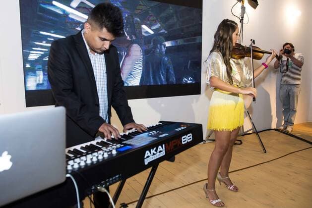 Violinist Elena Mikhailova and Dj Madison during a performance at MBFWM16 in Madrid. September 16, Spain. 2016.  (20160916017)