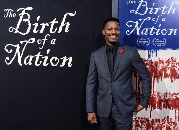 Writer director and cast member Nate Parker attends the premiere of the motion picture drama The Birth of a Nation at the ArcLight Cinerrama Dome in the Hollywood section of Los Angeles on September 21, 2016. Storyline: Nat Turner, a literate slave and preacher in the antebellum South, orchestrates an uprising.  LAP2016092101 JIMxRUYMEN