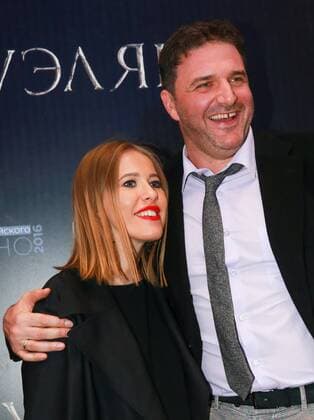 MOSCOW, RUSSIA - SEPTEMBER 21, 2016: Russian actor Maxim Vitorgan (R) and his wife, Russian TV presenter Ksenia Sobchak attend the Moscow premiere of Russian director Alexei Mizgirev s new film The Duelist at the Formula Kino na Kutuzovskom Cinema. Sergei Fadeichev TASS  TS031F4C