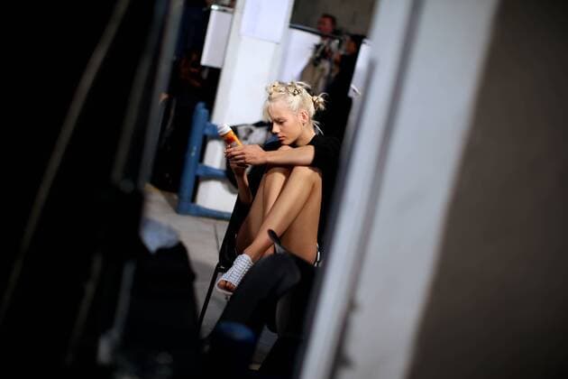 (160923) -- MILAN, Sept. 23, 2016 -- A model waits backstage of Diesel Black Gold fashion show during Milan Fashion Week Spring Summer 2017 in Milan, Italy, Sept. 23, 2016. )(cl) ITALY-MILAN-FASHION WEEK-DIESEL BLACK GOLD-BACKSTAGE JinxYu 
