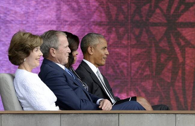 Former First Lady Laura Bush (L), former President George W. Bush, U.S President Barack Obama and First Lady Michelle Obama attend the opening ceremony of the Smithsonian National Museum of African American History and Culture on September 24, 2016 in Washington, DC. The museum is opening thirteen years after Congress and President George W. Bush authorized its construction. Pool  WAX20160924102 OlivierxDouliery