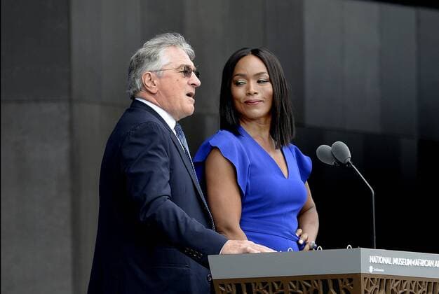 Robert De Niro and Angela Bassett speak at the opening ceremony of the Smithsonian National Museum of African American History and Culture on September 24, 2016 in Washington, DC. The museum is opening thirteen years after Congress and President George W. Bush authorized its construction. Pool  WAX20160924105 OlivierxDouliery