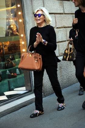 Milan, Amanda Lear in the center for fashion shows Amanda Lear arrives downtown to attend the fashion shows, in the company of a mysterious boy. Here they are walking along Via Montenapoleone.  Copyright: xMimmoxCarrierox