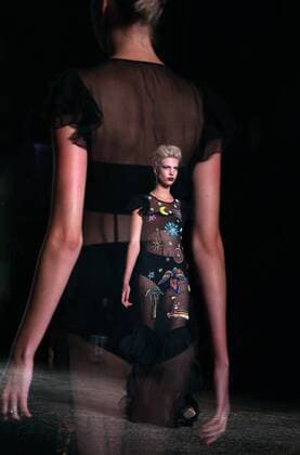 MILAN, Sept. 24, 2016 -- A model walks the runway during the Leitmotiv fashion show as part of Milan Fashion Week Spring Summer 2017 in Milan, Italy, on Sept. 24, 2016. (multiple exposure) ) (axy) ITALY-MILAN-FASHION WEEK-LEITMOTIV JinxYu 