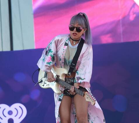 Las Vegas, Nevada, United States of America - JinJoo Lee, guitarist of pop rock group DNCE performs during the iHeartRadio Music Festival Daytime Village on September 24, 2016 at the Las Vegas Village in Las Vegas, Nevada. Las Vegas United States of America - ZUMAt114
