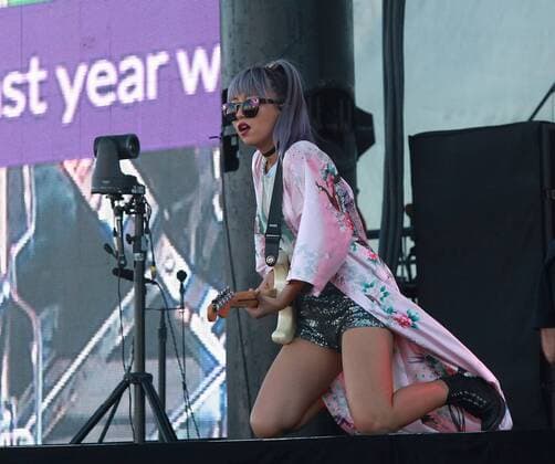 Las Vegas, Nevada, United States of America - JinJoo Lee, guitarist of pop rock group DNCE performs during the iHeartRadio Music Festival Daytime Village on September 24, 2016 at the Las Vegas Village in Las Vegas, Nevada. Las Vegas United States of America - ZUMAt114