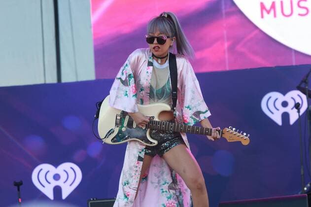 Las Vegas, Nevada, United States of America - JinJoo Lee, guitarist of pop rock group DNCE performs during the iHeartRadio Music Festival Daytime Village on September 24, 2016 at the Las Vegas Village in Las Vegas, Nevada. Las Vegas United States of America - ZUMAt114