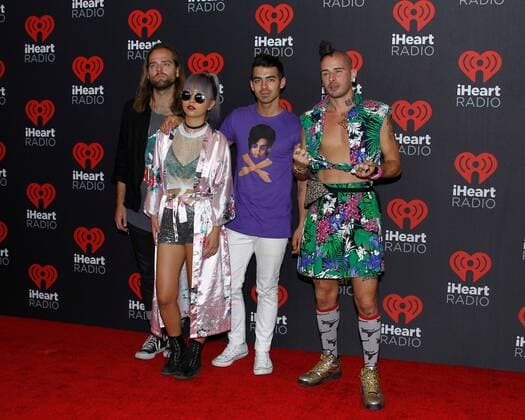 Pop band DNCE arrives for the iHeartRadio Music Festival at the T-Mobile Arena in Las Vegas, Nevada on September 24, 2016.  LVP2016092480 JAMESxATOA