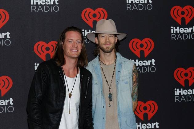 Tyler Hubbard and Brian Kelley of Florida Georgia Line arrive for the iHeartRadio Music Festival at the T-Mobile Arena in Las Vegas, Nevada on September 24, 2016.  LVP2016092498 JAMESxATOA