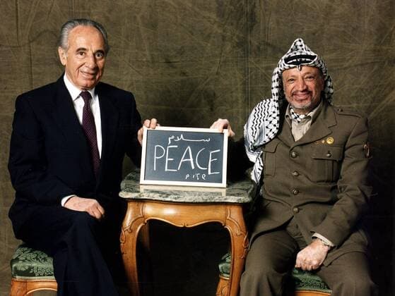 SHIMON PERES (2 August 1923 - 28 September 2016) was a Polish-born Israeli statesman. Born Szymon Perski, he was the ninth President of Israel from 2007 to 2014, served twice as the Prime Minister of Israel and twice as Interim Prime Minister, and he was a member of 12 cabinets in a political career spanning over 66 years. Peres won the 1994 Nobel Peace Prize together with Yitzhak Rabin and Yasser Arafat for the peace talks that he participated in as Israeli Foreign Minister, producing the Oslo Accords. PICTURED: Dec 1994 - Stockholm, Sweden - Foreign Minister of Israel SHIMON PERES (L) & Leader of the PLO YASSER ARAFAT hold a blackboard between them with PEACE written by the two in English & Arabic during a photosession at the Grand Hotel. Peres and Arafat received the Nobel Peace prize in Oslo two days earlier. Stockholm SWEDEN - ZUMAs57_