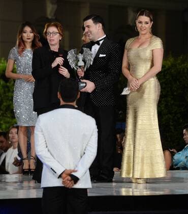 Beauty queen and actress Alicia Machado announces winners with Eduardo Khawam during the Metropolitan Fashion Week Closing Gala & Awards Show at Warner Bros Studios in Burbank, California on October 1, 2016. The former Miss Universe, whom Democratic presidential candidate Hillary Clinton mentioned during the first presidential debate, has been the subject of series of derisive tweets from Clinton s Republican opponent Donald Trump.  LAP2016100122 JIMxRUYMEN