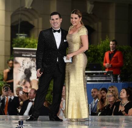 Beauty queen and actress Alicia Machado announces winners with Eduardo Khawam during the Metropolitan Fashion Week Closing Gala & Awards Show at Warner Bros Studios in Burbank, California on October 1, 2016. The former Miss Universe, whom Democratic presidential candidate Hillary Clinton mentioned during the first presidential debate, has been the subject of series of derisive tweets from Clinton s Republican opponent Donald Trump.  LAP2016100121 JIMxRUYMEN