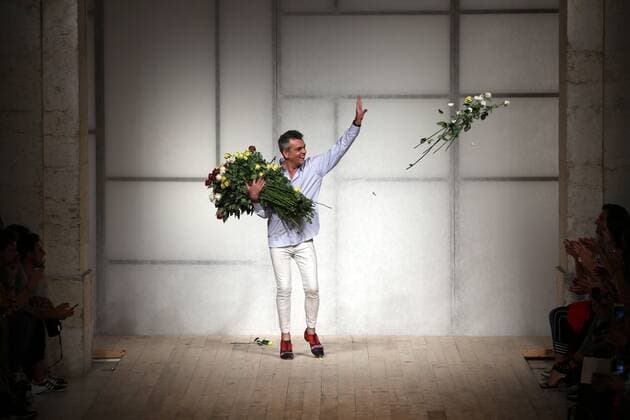October 9, 2016 - Lisbon, Portugal - Portuguese fashion designer Filipe Faisca acknowledges cheers and send flowers after presenting the Spring Summer 2017 collection during the Lisbon Fashion Week on October 9, 2016 in Lisbon, Portugal. Photo: Lisbon Portugal - ZUMAf123