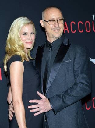 Director Gavin O Connor and his wife Brooke Burns arrive at the Los Angeles World Premiere of The Accountant at the TCL Chinese Theater in Los Angeles, California on October 10, 2016.  LAP20161010733 CHRISTINExCHEW