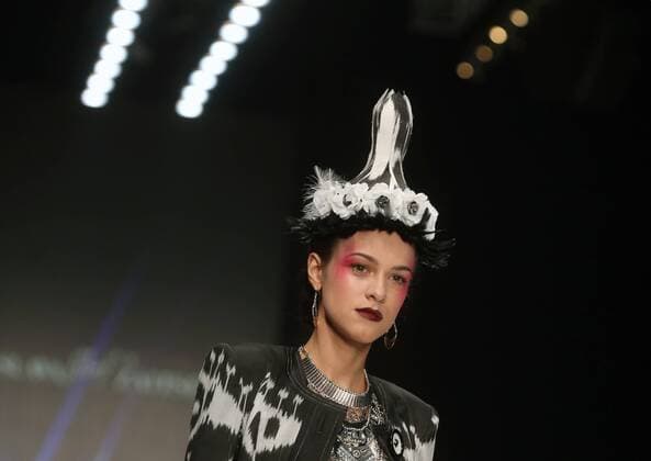 MOSCOW, RUSSIA â€“ OCTOBER 13, 2016: A model showcases a creation during a runway show for the Spring Summer 2017 collection by designer Slava Zaitsev at the Mercedes-Benz Fashion Week Russia in the Manege Central Exhibition Hall. Vyacheslav Prokofyev TASS  TS034685