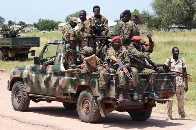 Photo taken on Oct. 16, 2016 shows South Sudan s government troops patrolling in Malakal town, South Sudan. Fresh clashes between government and opposition forces near the northern town of Malakal have killed at least 56 over the weekend, a military spokesman said late Sunday. ) (dtf) SOUTH SUDAN-MALAKAL-CONFLICT GalexJulius 