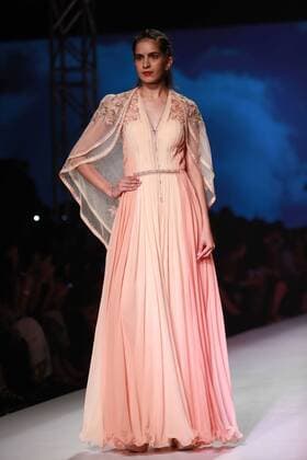 NEW DELHI, INDIA - OCTOBER 15: A model showcases the creation of designer Mandira Wirk during Amazon India Fashion Week Spring-Summer 17 at NSIC Exhibition Complex on October 15, 2016 in New Delhi, India. (Photo by Amal Ks Hindustan Times) Amazon India Fashion Week Spring Summer 2017