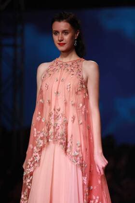 NEW DELHI, INDIA - OCTOBER 15: A model showcases the creation of designer Mandira Wirk during Amazon India Fashion Week Spring-Summer 17 at NSIC Exhibition Complex on October 15, 2016 in New Delhi, India. (Photo by Amal Ks Hindustan Times) Amazon India Fashion Week Spring Summer 2017
