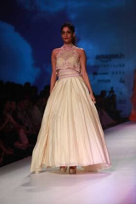 NEW DELHI, INDIA - OCTOBER 15: A model showcases the creation of designer Mandira Wirk during Amazon India Fashion Week Spring-Summer 17 at NSIC Exhibition Complex on October 15, 2016 in New Delhi, India. (Photo by Amal Ks Hindustan Times) Amazon India Fashion Week Spring Summer 2017