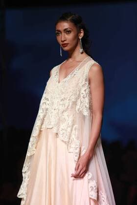 NEW DELHI, INDIA - OCTOBER 15: A model showcases the creation of designer Mandira Wirk during Amazon India Fashion Week Spring-Summer 17 at NSIC Exhibition Complex on October 15, 2016 in New Delhi, India. (Photo by Amal Ks Hindustan Times) Amazon India Fashion Week Spring Summer 2017