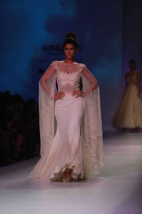 NEW DELHI, INDIA - OCTOBER 15: A model showcases the creation of designer Mandira Wirk during Amazon India Fashion Week Spring-Summer 17 at NSIC Exhibition Complex on October 15, 2016 in New Delhi, India. (Photo by Amal Ks Hindustan Times) Amazon India Fashion Week Spring Summer 2017