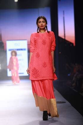 NEW DELHI, INDIA - OCTOBER 15: A model showcases the creation of designer Masaba Gupta during Amazon India Fashion Week Spring-Summer 17 at NSIC Exhibition Complex on October 15, 2016 in New Delhi, India. (Photo by Amal Ks Hindustan Times) Amazon India Fashion Week Spring Summer 2017