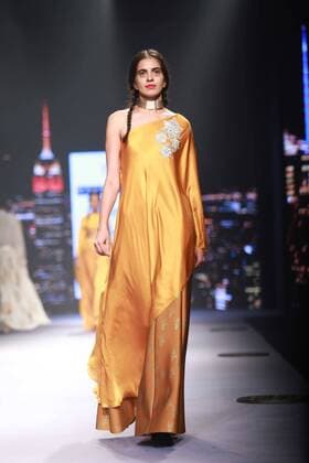 NEW DELHI, INDIA - OCTOBER 15: A model showcases the creation of designer Masaba Gupta during Amazon India Fashion Week Spring-Summer 17 at NSIC Exhibition Complex on October 15, 2016 in New Delhi, India. (Photo by Amal Ks Hindustan Times) Amazon India Fashion Week Spring Summer 2017
