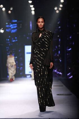 NEW DELHI, INDIA - OCTOBER 15: A model showcases the creation of designer Masaba Gupta during Amazon India Fashion Week Spring-Summer 17 at NSIC Exhibition Complex on October 15, 2016 in New Delhi, India. (Photo by Amal Ks Hindustan Times) Amazon India Fashion Week Spring Summer 2017