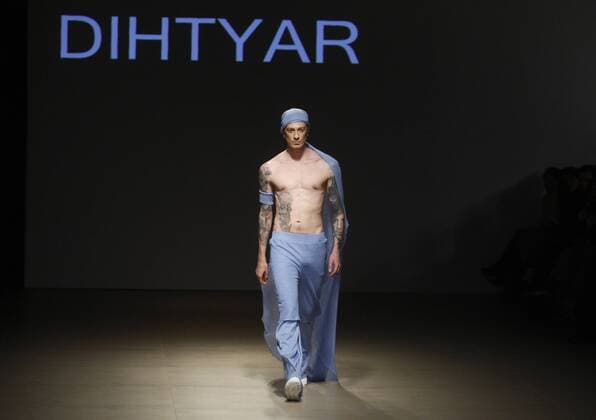 October 17, 2016 - Kiev, Ukraine - A model presents a creation by Ukrainian designer DMITRIY DIHTYAR, during the Ukrainian Fashion Week in Kiev, Ukraine,on 17 October,2016. The fashion event presents Spring Summer 2017 collections by Ukrainian and International designers,from 12 to 18 October. Kiev Ukraine - ZUMAg194