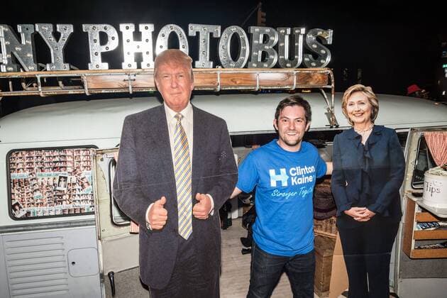 A man poses next to real-size cardboard cut outs of Republican presidential candidate Donald Trump and Democratic presidential candidate Hillary Clinton outside a New York theater screening the premiere of the documentary Michael Moore In TrumpLand on October 18, 2016. Filmmaker Michael Moore had finished editing the film the previous day and made a surprise last-minute announcement on Twitter that he would show it for free today. The film will play for a week in Los Angeles and New York starting tomorrow. Photo by Enrique Shore Cordon Press  ENRIQUExSHORE Man poses next to real-size cardboard cut outs of Donald Trump a