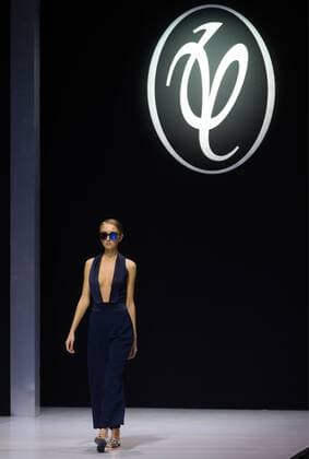 MOSCOW, RUSSIA - OCTOBER 18, 2016: A model showcases a creation during a runway show for the Spring Summer 2017 collection by designer Valentin Yudashkin at the 2016 Moscow Fashion Week, in Moscow s Gostiny Dvor Shopping and Exhibition Centre. Dmitry Serebryakov TASS  TS034D99