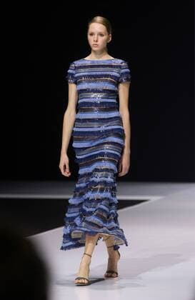 MOSCOW, RUSSIA - OCTOBER 18, 2016: A model showcases a creation during a runway show for the Spring Summer 2017 collection by designer Valentin Yudashkin at the 2016 Moscow Fashion Week, in Moscow s Gostiny Dvor Shopping and Exhibition Centre. Dmitry Serebryakov TASS  TS034D9B