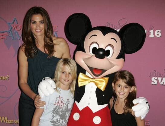 Oct 05, 2008 - Anaheim, California, USA - Model CINDY CRAWFORD with her son PRESLEY, daughter KAIA and MINNIE MOUSE at the Miley Cyrus Sweet 16 Birthday Party held at Disneyland in Anaheim. - ZUMAo05_ 20081005_mkh_o05_687