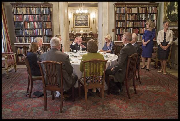 . 06 09 2016. London, United Kingdom. Prince Charles tea for veterans. The Prince of Wales, Patron, The Battle of Britain Fighter Association, and The Duchess of Cornwall host a tea for veterans, widows and members of the Battle of Britain Fighter Association, Clarence House, London. Here, Squadron Leader Dick Summers entertains the table and The Duchess  xi-Imagesx xPoolx IIM-13648-0003