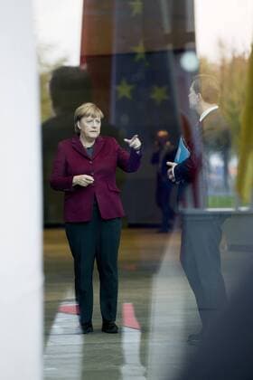 October 19, 2016 - Berlin, Germany - German Chancellor Angela Merkel and her spokesman Steffen Seibert are pictured as she awaits for the arrival of Ukrainian President Petro Poroshenko before his arrival at the Chancellery in Berlin, Germany on October 19, 2016. German Chancellor Angela Merkel is meeting in the Normandy format with French President Francois Hollande, Russian President Vladimir Putin and Ukrainian President Petro Poroshenko to discuss security in Ukraine and in Syria. Berlin Germany  - ZUMAn230 20161019_zaa_n230_068