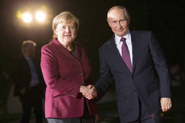 October 19, 2016 - Berlin, Germany - German Chancellor Angela Merkel and Russian President Vladimir Putin pose for the photographers upon his arrival at the Chancellery in Berlin, Germany on October 19, 2016. German Chancellor Angela Merkel is meeting in the Normandy format with French President Francois Hollande, Russian President Vladimir Putin and Ukrainian President Petro Poroshenko to discuss security in Ukraine and in Syria. Berlin Germany  - ZUMAn230 20161019_zaa_n230_082