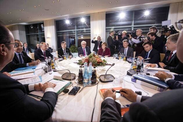 BERLIN, GERMANY - OCTOBER 19, 2016: France s President Francois Hollande, Russia s Foreign Minister Sergei Lavrov, Russia s President Vladimir Putin, Russian Presidential Aide Vladislav Surkov, Germany s Foreign Minister Frank-Walter Steinmeier, Germany s Chancellor Angela Merkel, Christoph Heusgen, Foreign and Security Policy Adviser to the German Chancellor, Ukraine s Foreign Minister Pavlo Klimkin and Ukraine s President Petro Poroshenko (L-R) attend Normandy Format talks on the settlement of the conflict in eastern Ukraine. Mikhail Palinchak Press Office of the President of Ukraine TASS  TS034F51