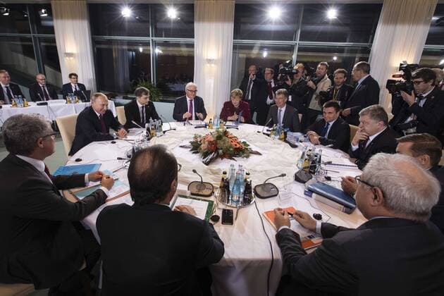 France s President Francois Hollande, Russia s Foreign Minister Sergei Lavrov, Russia s President Vladimir Putin, Russian Presidential Aide Vladislav Surkov, Germany s Foreign Minister Frank-Walter Steinmeier, Germany s Chancellor Angela Merkel, Christoph Heusgen, Foreign and Security Policy Adviser to the German Chancellor, Ukraine s Foreign Minister Pavlo Klimkin and Ukraine s President Petro Poroshenko (L-R) attend Normandy Meeting in Berlin, Germany  Copyright: PalinchakxMikhail 479053