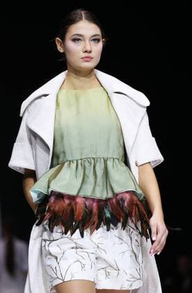 MOSCOW, RUSSIA - OCTOBER 21, 2016: A model showcases creations during a a runway show for the Spring Summer 2017 collection by Russian fashion designer Alina Assi at the 2016 Moscow Fashion Week, in Moscow s Gostiny Dvor Shopping and Exhibition Centre. Artyom Geodakyan TASS  TS0352D1
