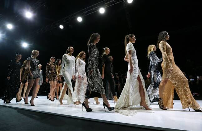 MOSCOW, RUSSIA - OCTOBER 21, 2016: Models showcase creations during a runway show for the Spring Summer 2017 collection by Russian fashion brand Alla Couture at the 2016 Moscow Fashion Week, at Moscow s Gostiny Dvor Shopping and Exhibition Centre. Artyom Geodakyan TASS  TS035321