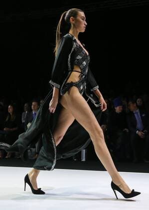 MOSCOW, RUSSIA - OCTOBER 21, 2016: A model showcases creations during a runway show for the Spring Summer 2017 collection by Russian fashion brand Alla Couture at the 2016 Moscow Fashion Week, at Moscow s Gostiny Dvor Shopping and Exhibition Centre. Artyom Geodakyan TASS  TS03531E