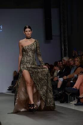 Greece: Second day of 10th AXDW in Athens A model wears a creation of Olga Karaververi fashion designer. Second day of the 10th Athens Xclusive Designers Week fashion event in Athens with many Greek fashion designers showcasing their creations.  GeorgexPanagakis