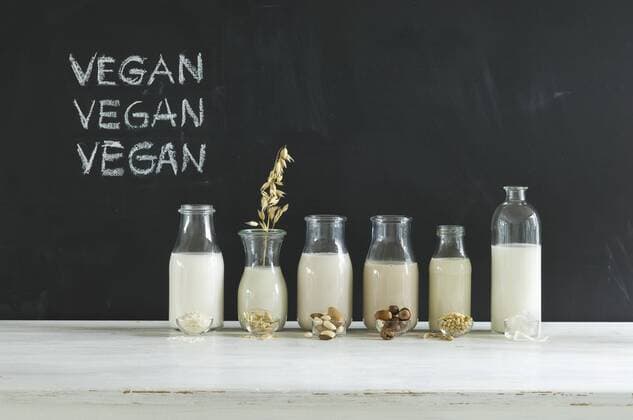 Glass bottles of various vegan milks  ASF06047