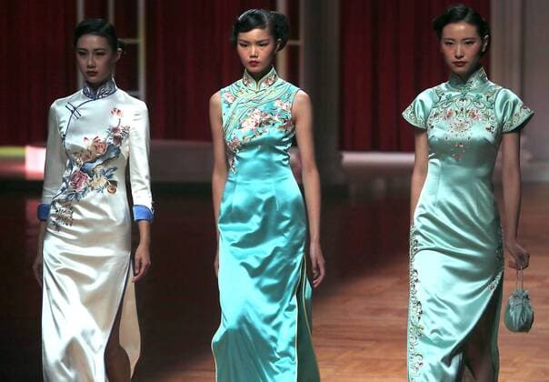 Chinese models wear clothing from the NE Tiger 2017 collection during China s international fashion week in Beijing on October 25, 2016. Chinese fashion designers are becoming an international force with both European and American fashion houses looking at the new, fresh Chinese clothing-minds as potential partners in future clothing brands.  PEK2016102514 STEPHENxSHAVER
