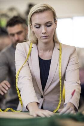 Fashion designer working in workshop model released Symbolfoto property released  ZEF10665