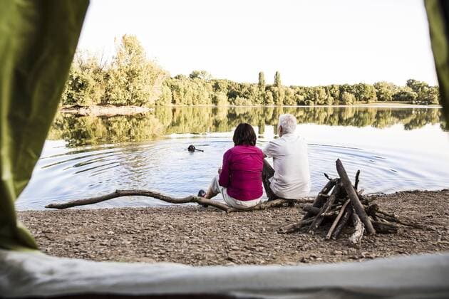 Senior couple camping at a lake model released Symbolfoto property released  ONF01078