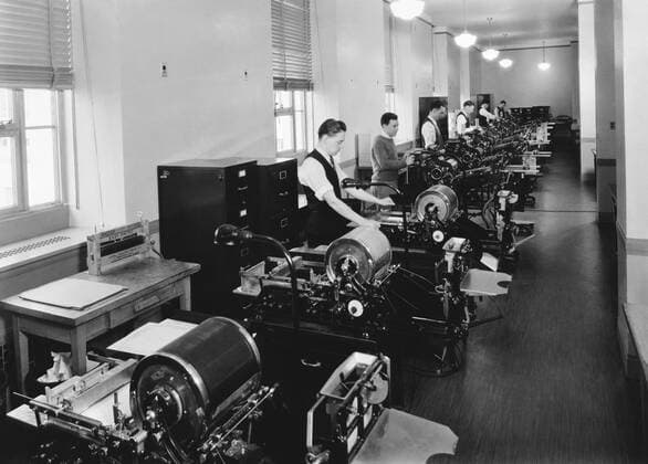Washington, D.C.: c. 1937 Workers running mimeograph and multi-lith machines in the mechanical section of the Federal Bureau of Investigation. xUnderwoodxArchives 1-Off-Equip_9
